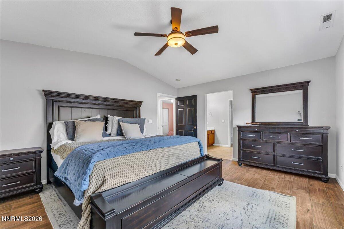 17725 Gingko Court Reno, NV 89508 - Photo 16 of 37 a bedroom with a bed and a dresser