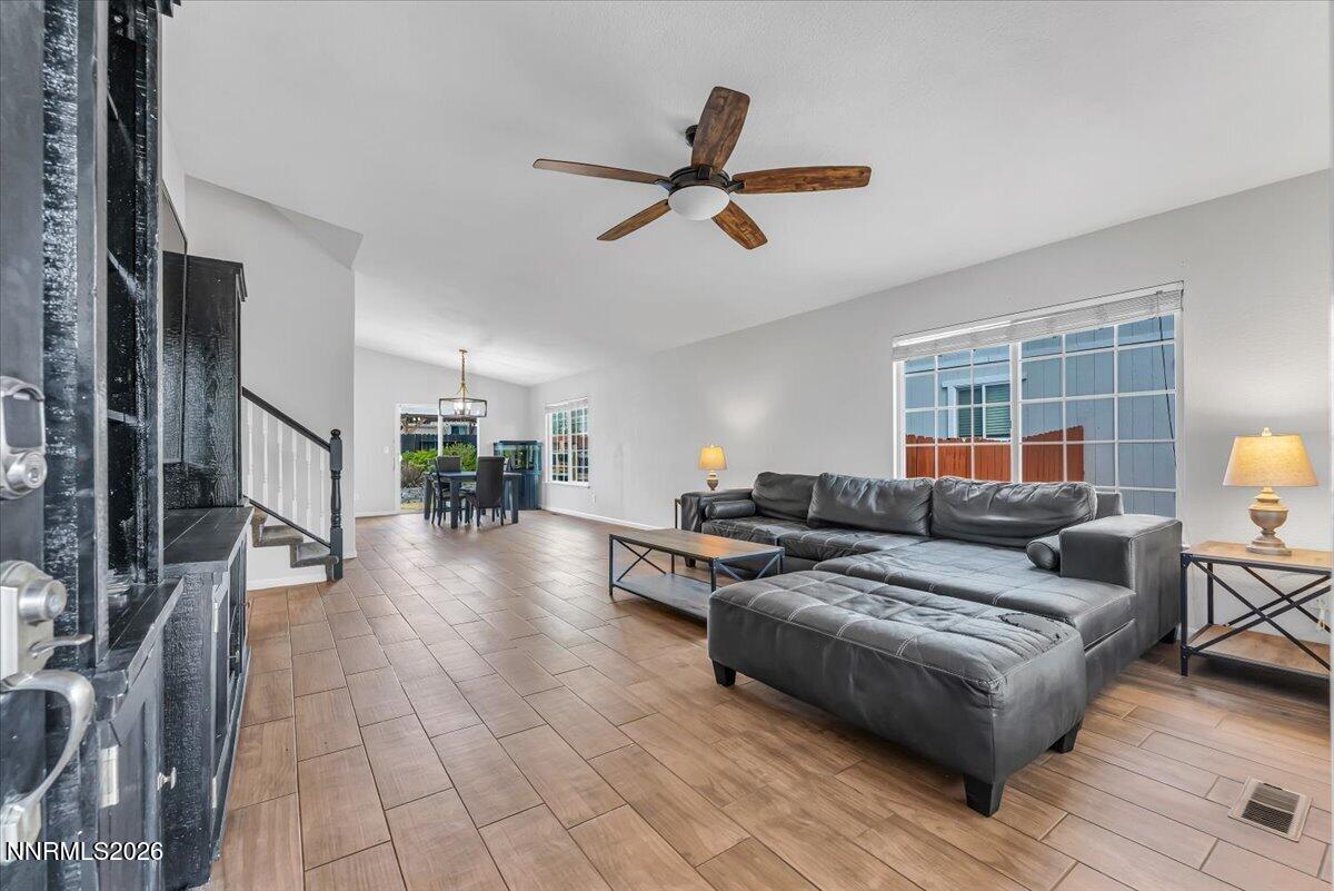 17725 Gingko Court Reno, NV 89508 - Photo 2 of 37 a living room with furniture and a window