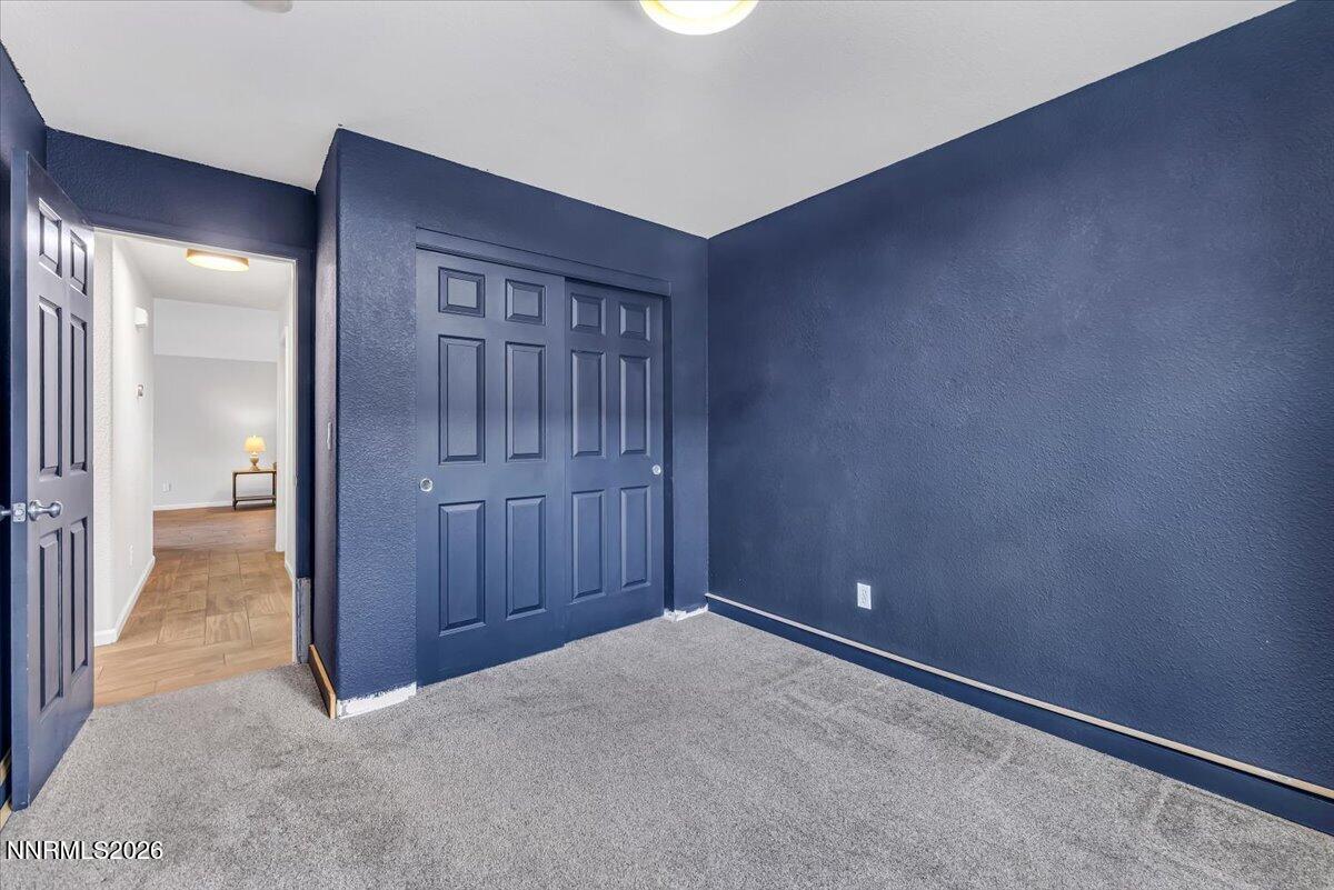 17725 Gingko Court Reno, NV 89508 - Photo 21 of 37 an empty room with closet