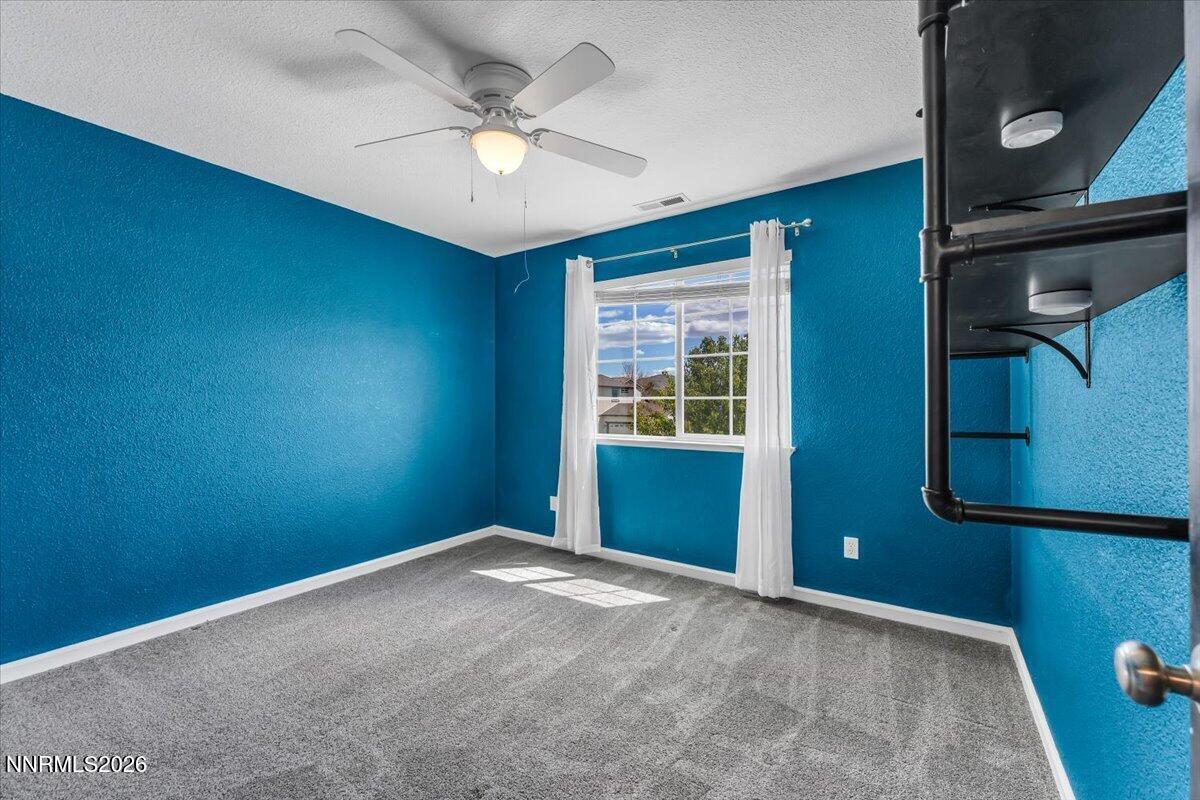 17725 Gingko Court Reno, NV 89508 - Photo 25 of 37 an empty room with windows