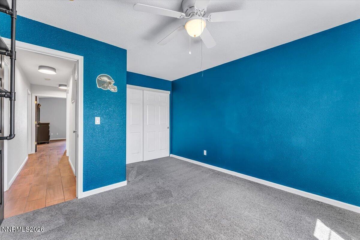 17725 Gingko Court Reno, NV 89508 - Photo 26 of 37 wooden floor in an empty room with a window
