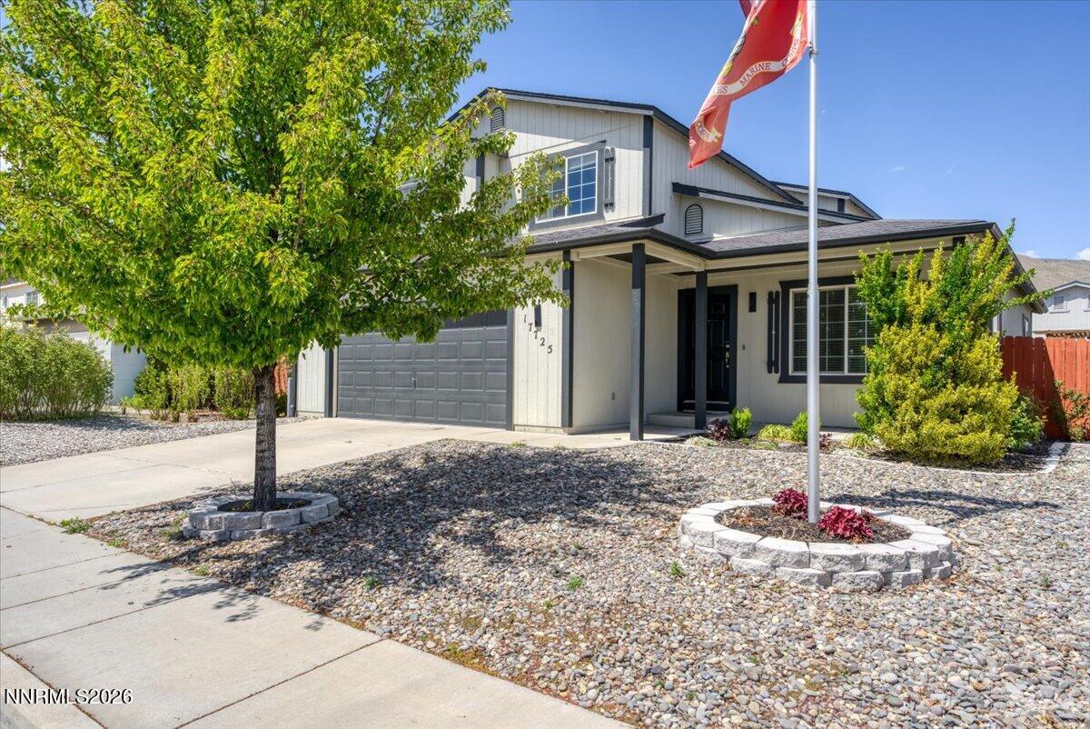 17725 Gingko Court Reno, NV 89508 - Photo 35 of 37 a front view of a house with a yard and garage