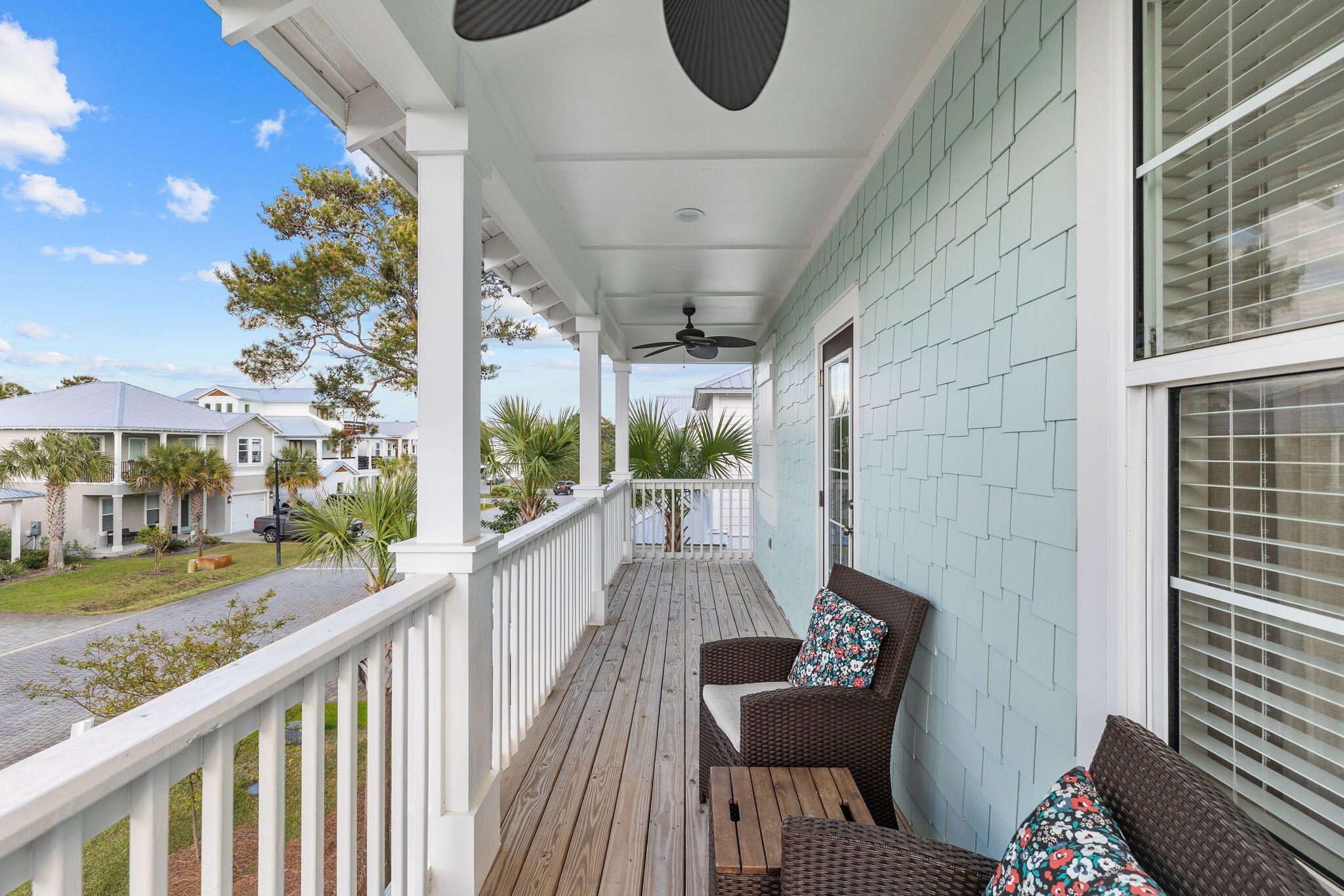 47 Ruth Street Miramar Beach, FL 32550 - Photo 36 of 63 a view of a porch with furniture and a gate