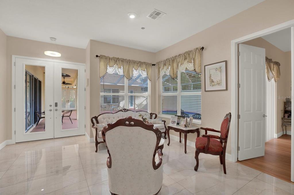 7190 Raymond Place Spring Hill, FL 34607 - Photo 15 of 41 a view of a dining room with furniture window and outside view