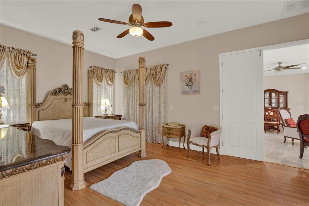 7190 Raymond Place Spring Hill, FL 34607 - Photo 21 of 41 a view of a livingroom with furniture and a ceiling fan