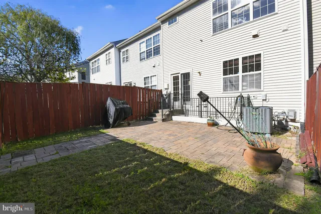 a house view with a backyard space