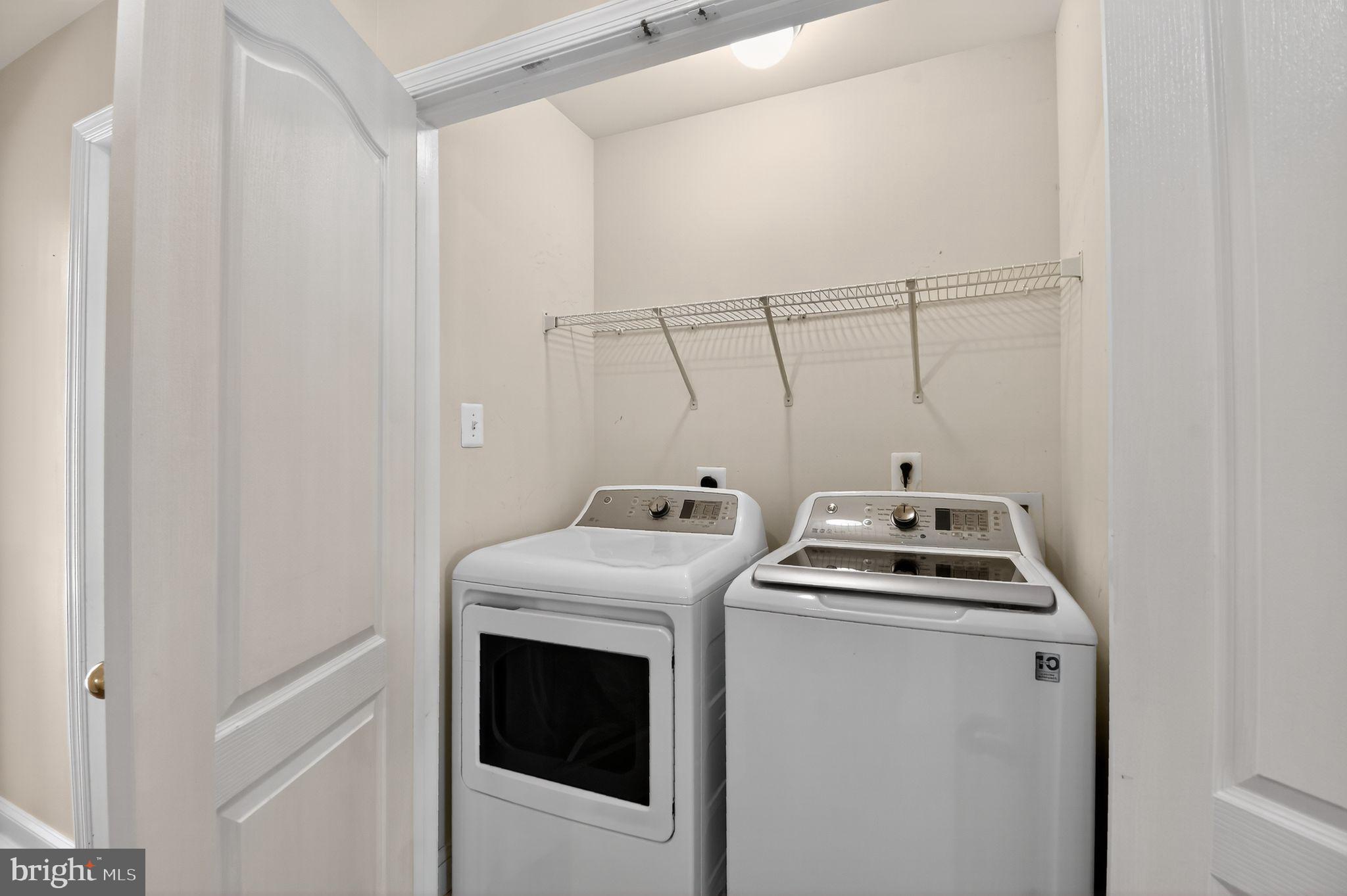 16567 Bramblewood Lane Woodbridge, VA 22191 - Photo 15 of 15 a utility room with dryer and washer