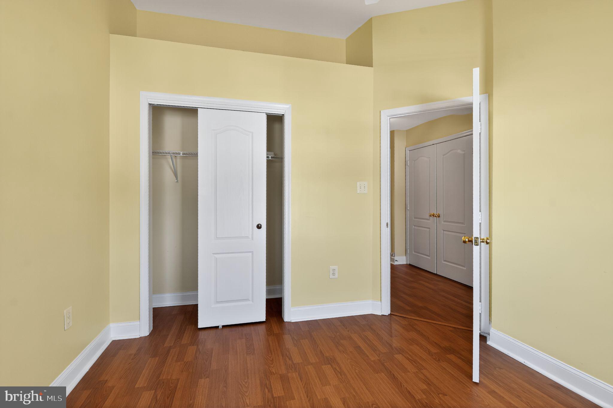 16567 Bramblewood Lane Woodbridge, VA 22191 - Photo 7 of 15 a view of a hallway with wooden floor