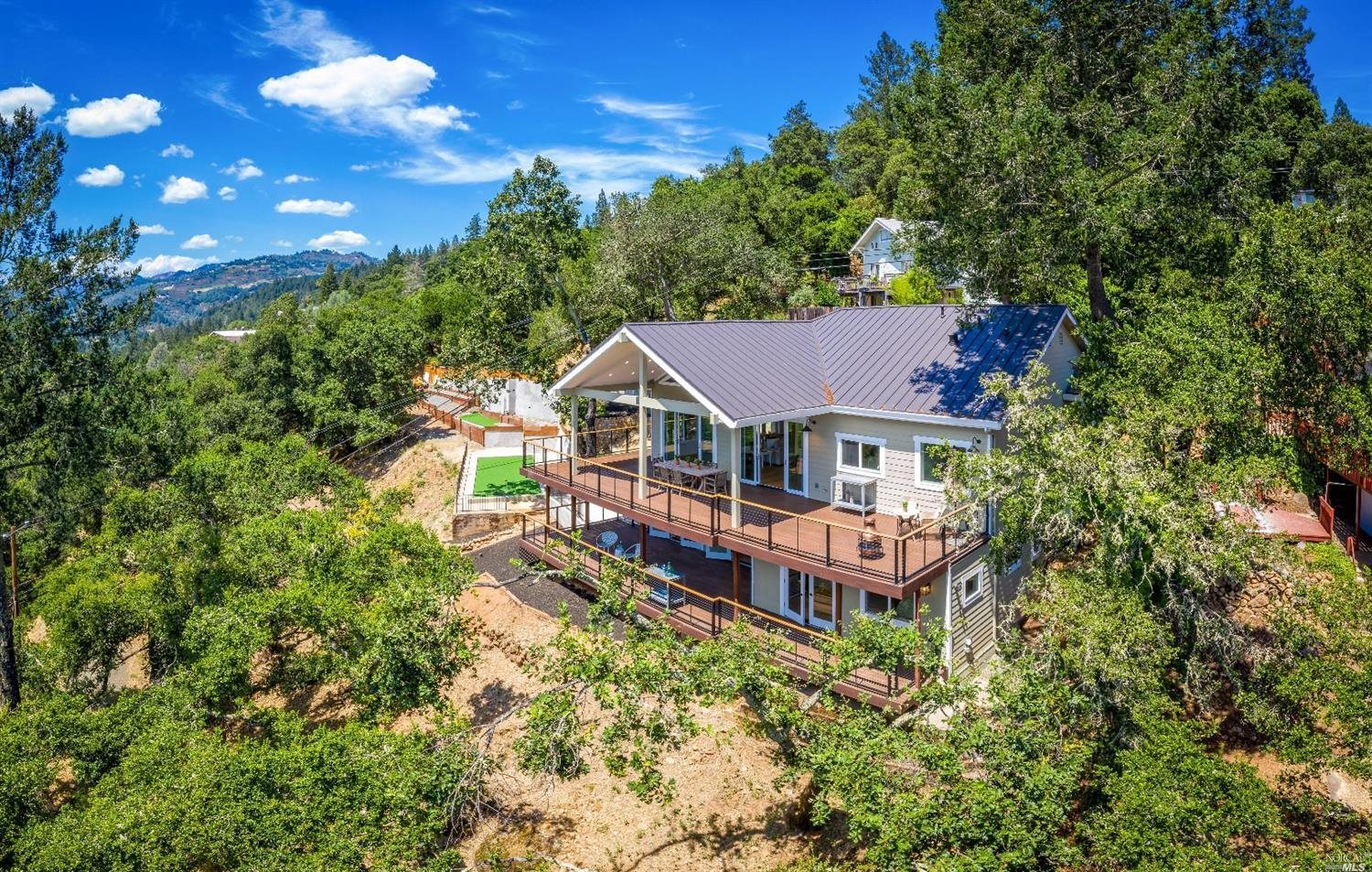 601 Sunnyside Road St. Helena, CA 94574 - Photo 1 of 1 a aerial view of a house with swimming pool next to a yard