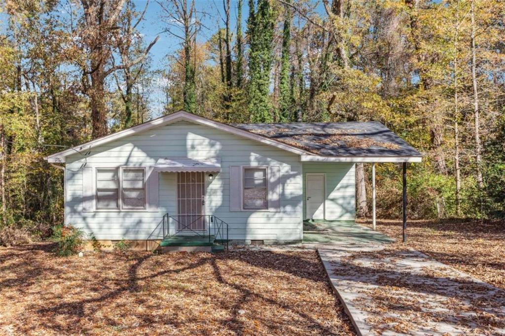 4180 Canby Lane Decatur, GA 30035 - Photo 1 of 1 a front view of a house with garden