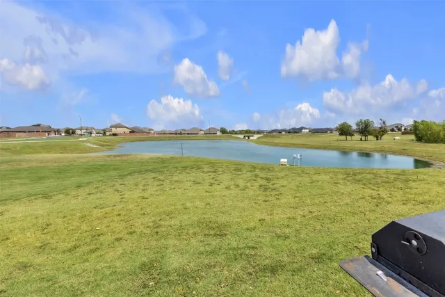 a view of an ocean and city