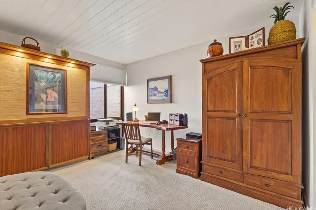 a view of a livingroom with furniture and window