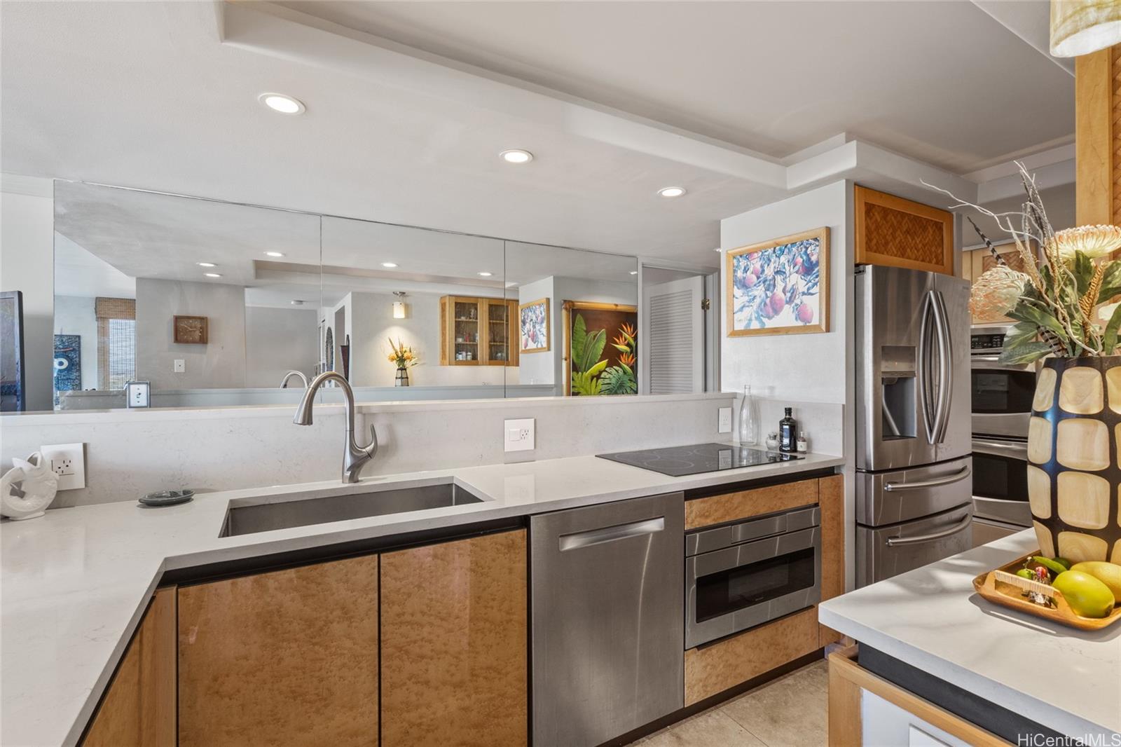 217 Prospect Street, Unit M8 Honolulu, HI 96813 - Photo 9 of 20 a kitchen with sink cabinets and appliances