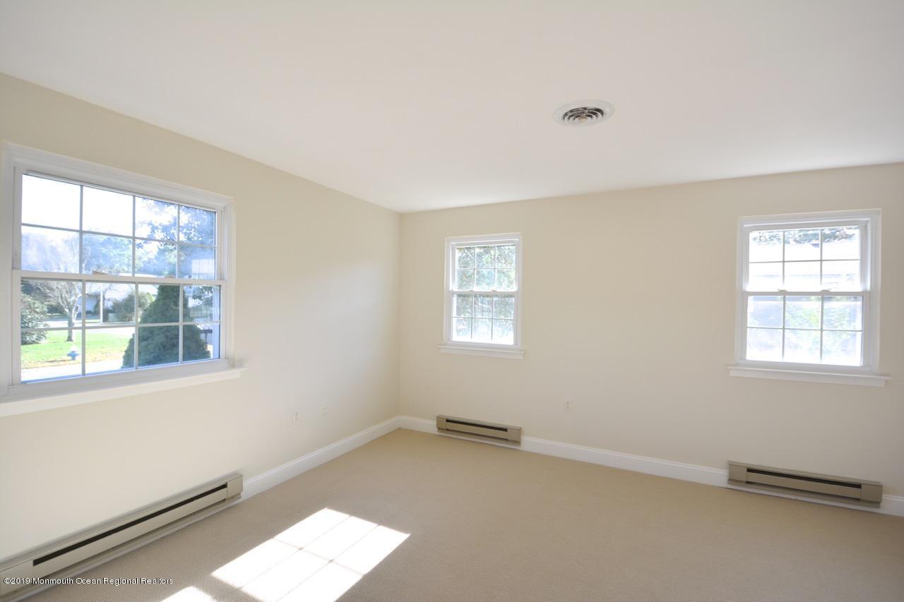 31 Berkshire Road Whiting, NJ 08759 - Photo 11 of 25 a view of an empty room with a window
