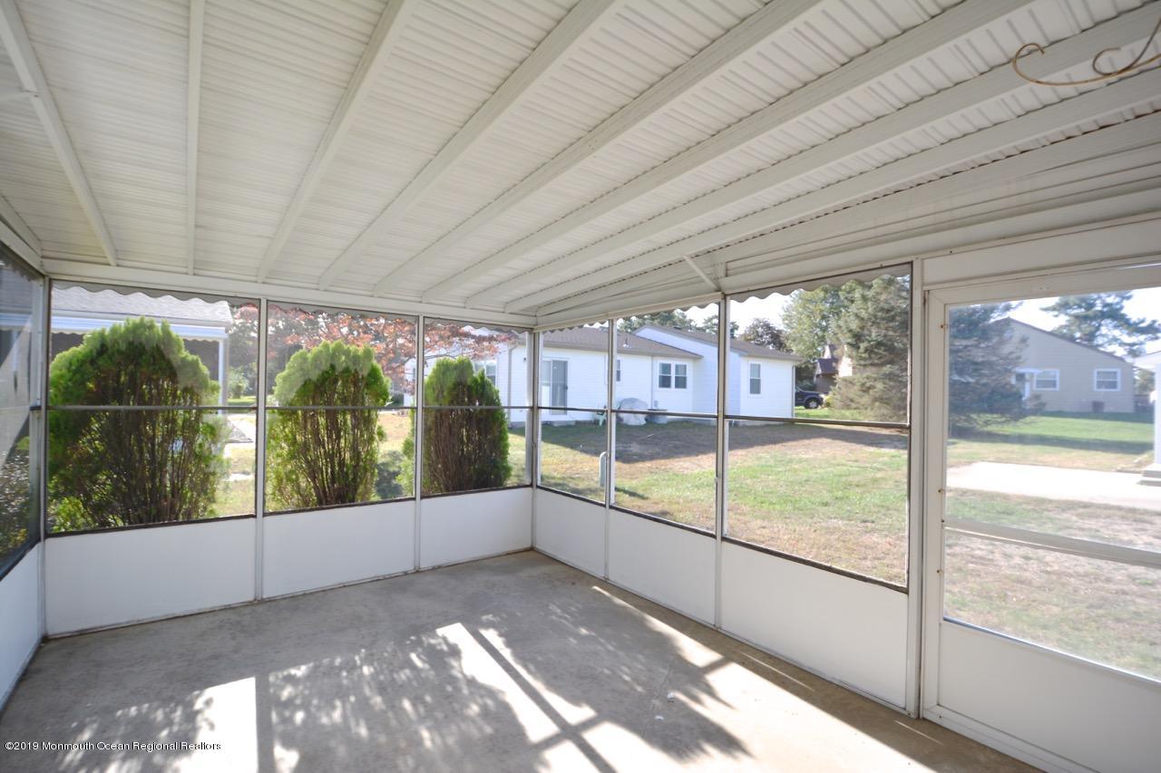 31 Berkshire Road Whiting, NJ 08759 - Photo 19 of 25 a view of an outdoor space with a balcony