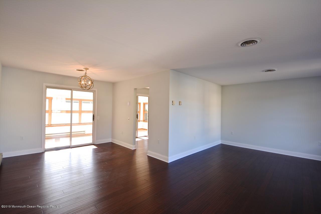 31 Berkshire Road Whiting, NJ 08759 - Photo 25 of 25 a view of an empty room with wooden floor and a window