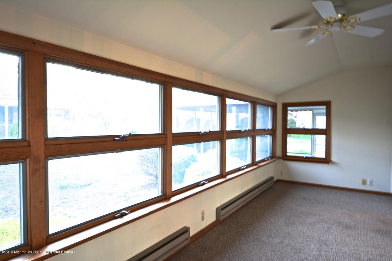 31 Berkshire Road Whiting, NJ 08759 - Photo 9 of 25 a view of an empty room with a window