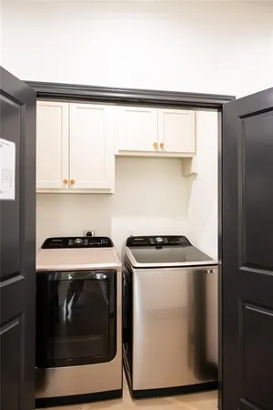 a kitchen with a stove and a microwave