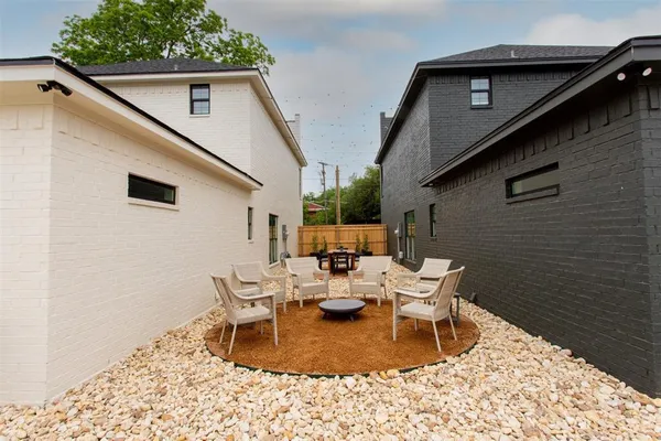 a view of a backyard with a patio