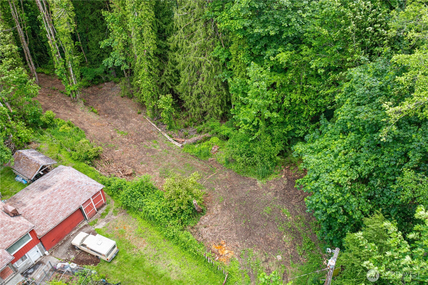 123 East 4th Street Port Orchard, WA 98366 - Photo 4 of 16 a view of a yard with plants and a small fountain