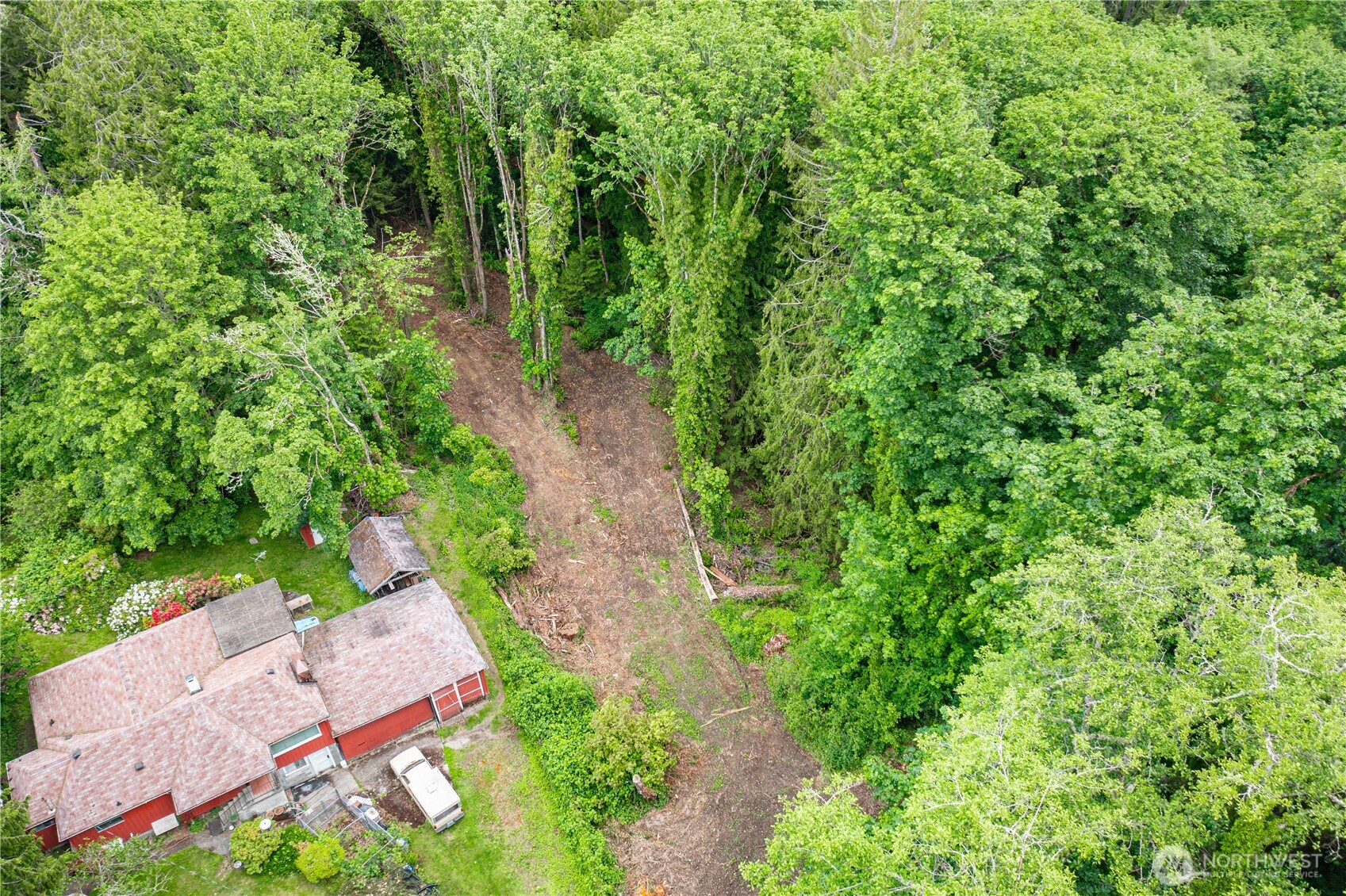 123 East 4th Street Port Orchard, WA 98366 - Photo 5 of 16 an aerial view of residential house with outdoor space and trees all around