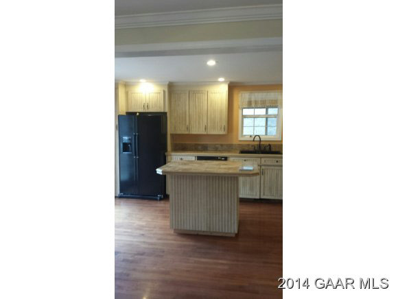 269 Dabneys Road Raphine, VA 24472 - Photo 15 of 22 a room with a sink cabinets and wooden floor