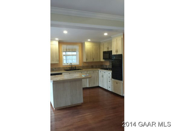 269 Dabneys Road Raphine, VA 24472 - Photo 16 of 22 a kitchen with a sink and cabinets