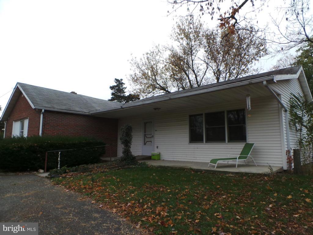 566 Johnsons Mill Road Berkeley Springs, WV 25411 - Photo 1 of 29 Exterior (Front)