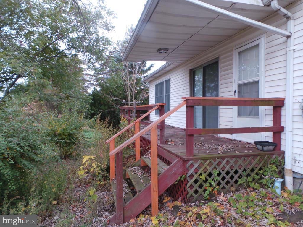 566 Johnsons Mill Road Berkeley Springs, WV 25411 - Photo 26 of 29 Exterior (Rear)