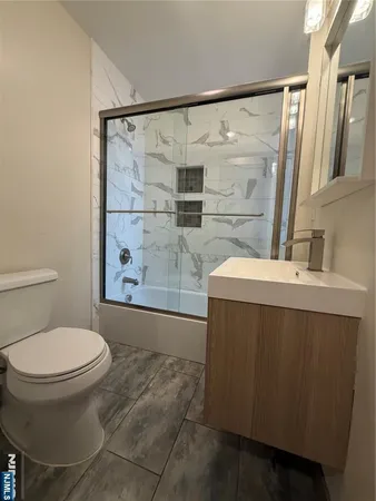 a bathroom with a sink and a toilet