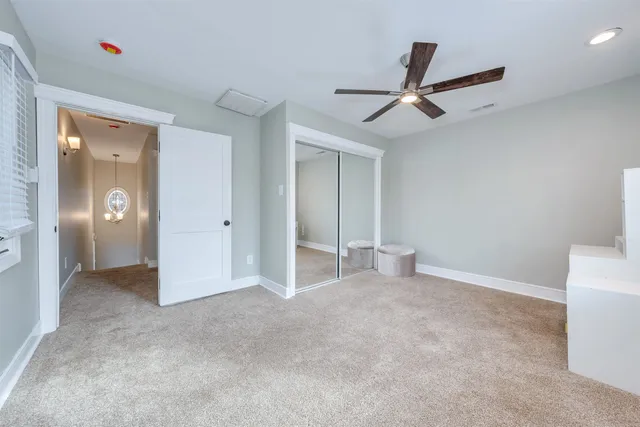 an empty room with a bathroom