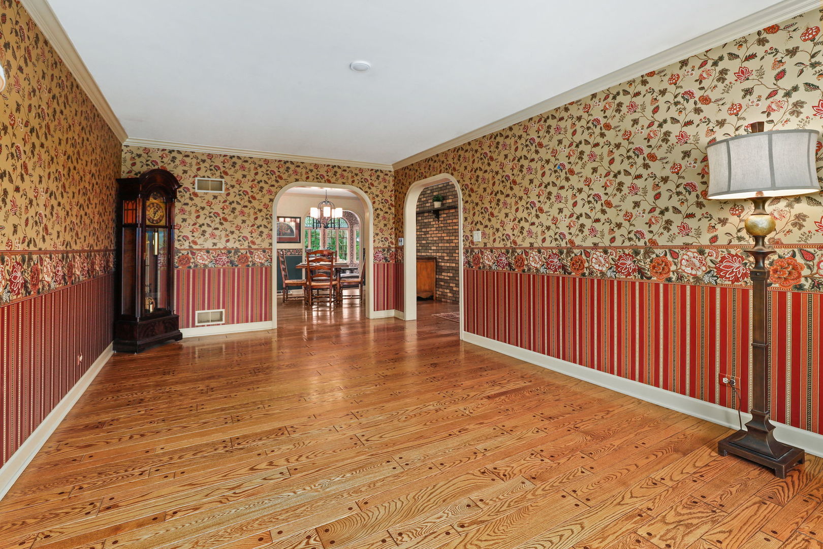 518 Northgate Road Lindenhurst, IL 60046 - Photo 14 of 35 wooden floor in a hall with a large window
