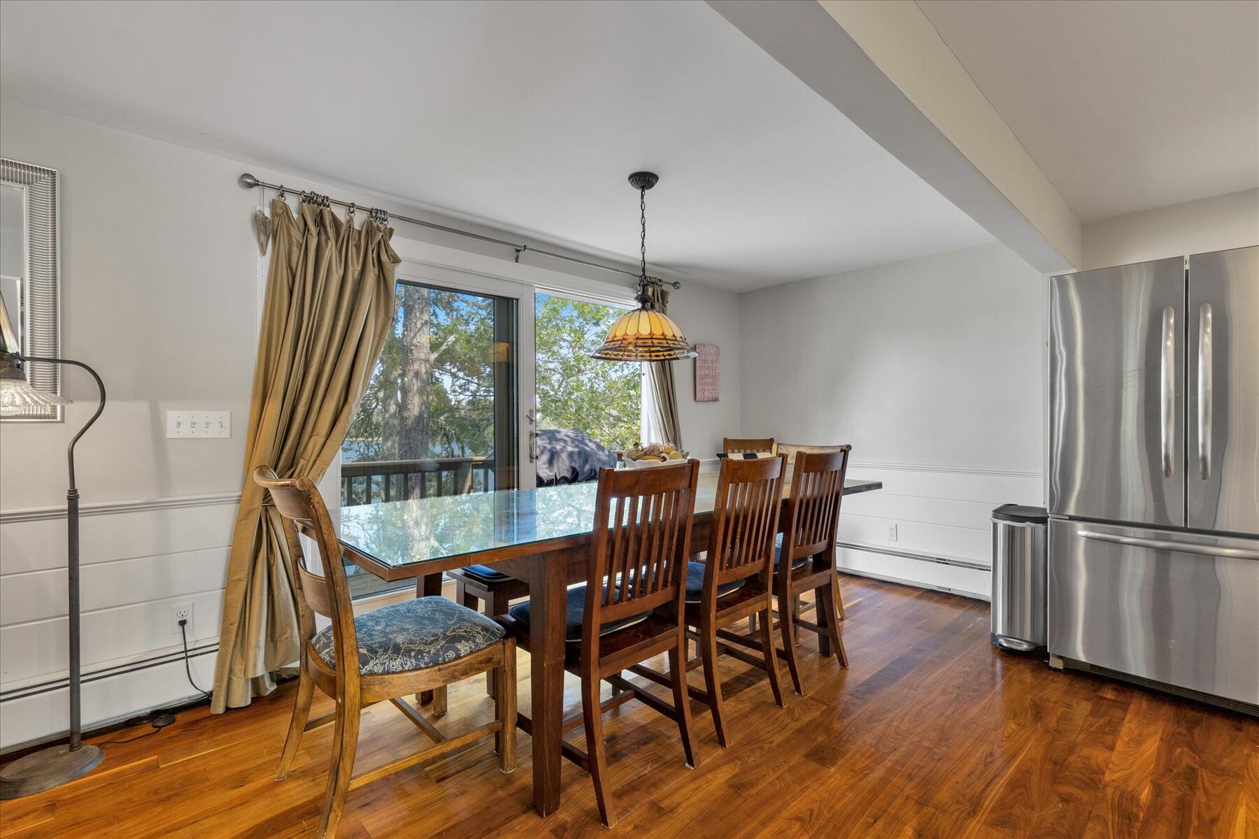 194 John Joseph Road Harwich, MA 02645 - Photo 15 of 87 a view of a dining room with furniture window and wooden floor