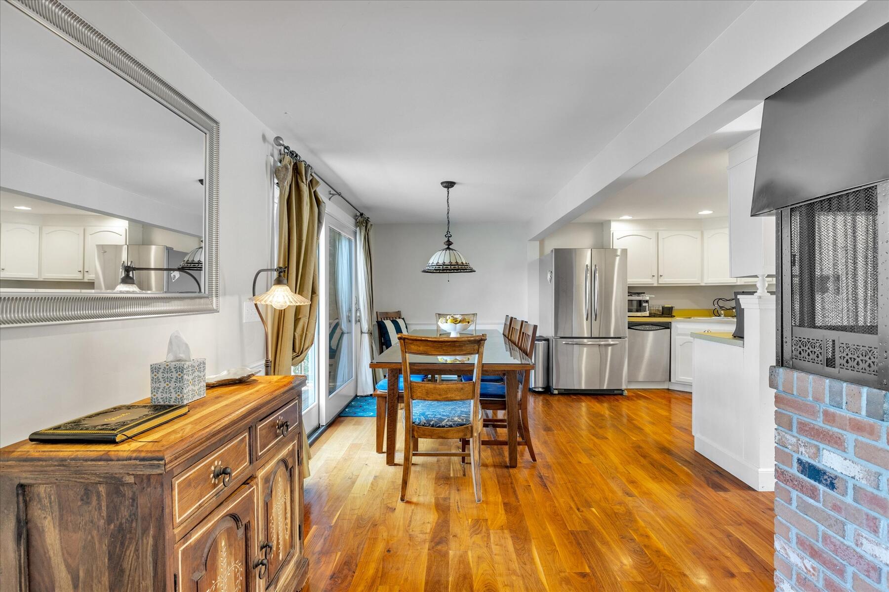 194 John Joseph Road Harwich, MA 02645 - Photo 16 of 87 a dining room with furniture and wooden floor