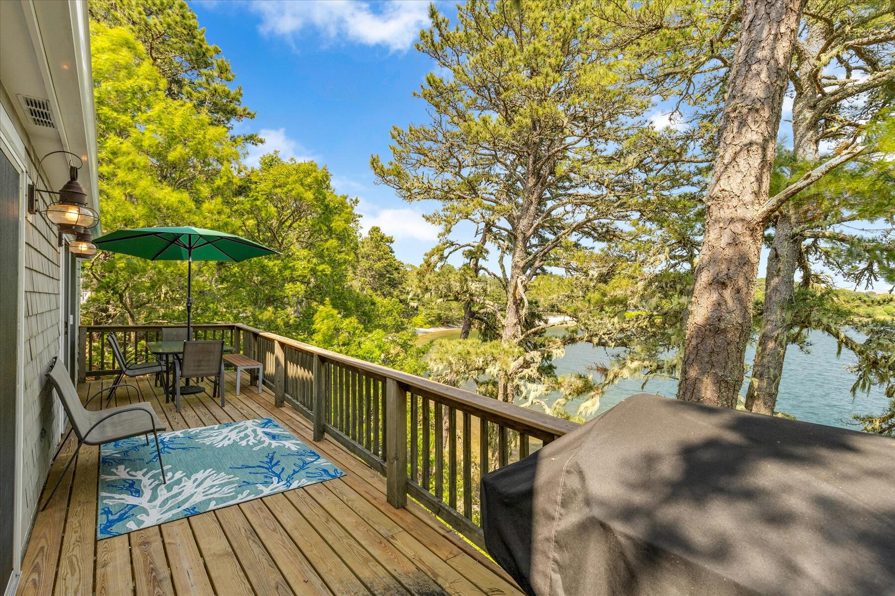 194 John Joseph Road Harwich, MA 02645 - Photo 19 of 87 a view of balcony with wooden floor and seating space