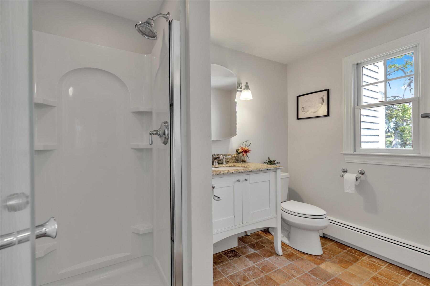 194 John Joseph Road Harwich, MA 02645 - Photo 28 of 87 a bathroom with a toilet sink and shower