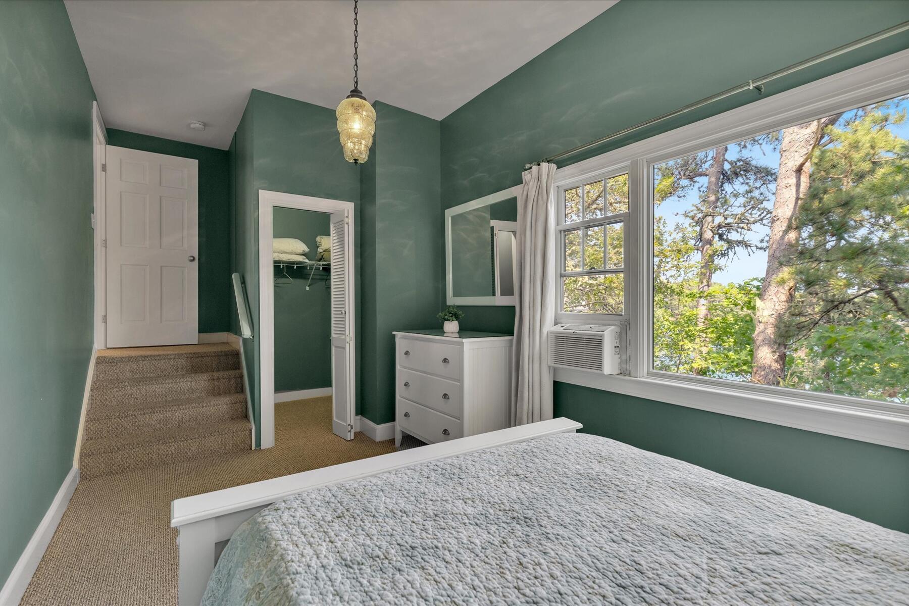 194 John Joseph Road Harwich, MA 02645 - Photo 33 of 87 a bedroom with a bed and a large window