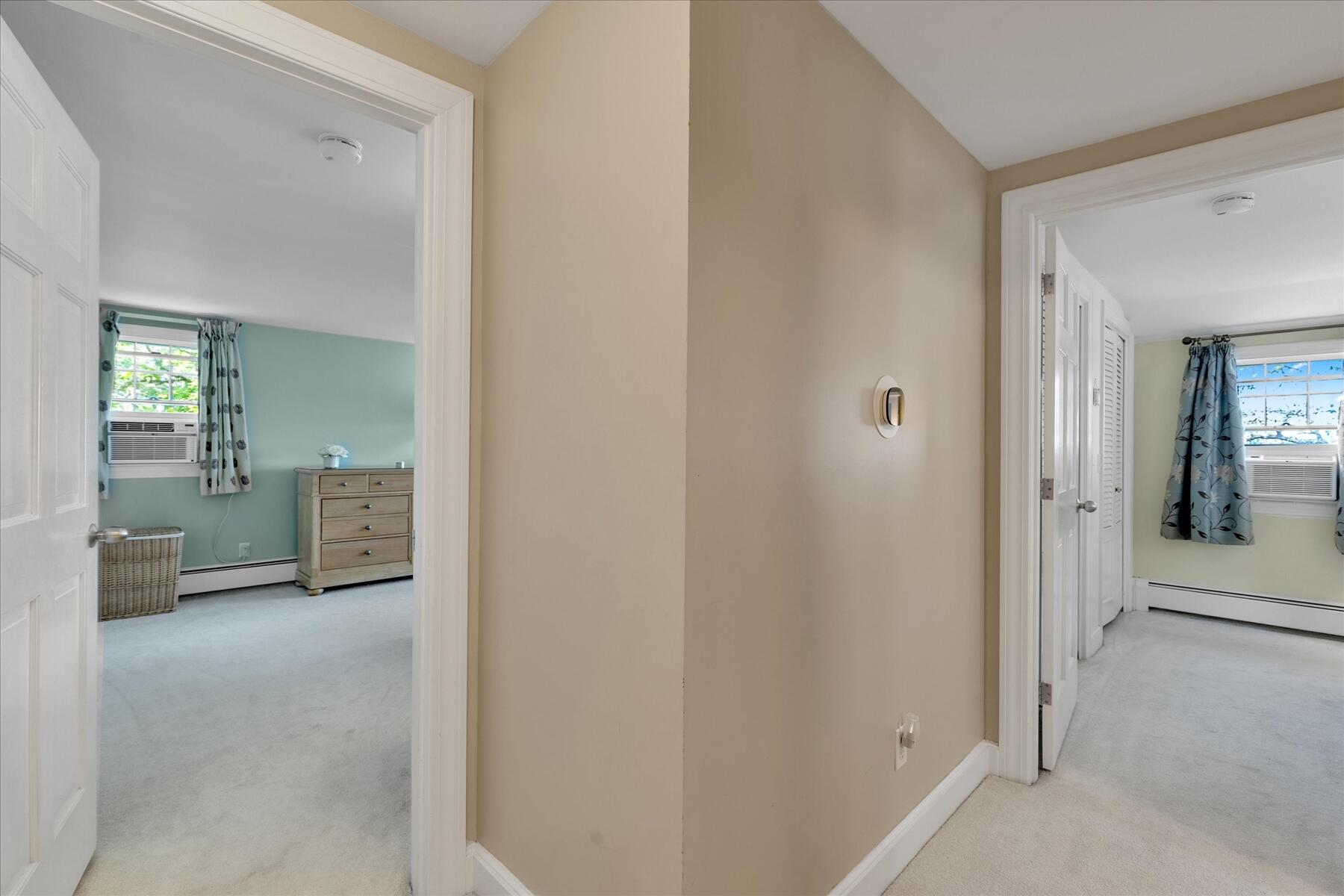 194 John Joseph Road Harwich, MA 02645 - Photo 37 of 87 a view of a hallway with some storage and utility room