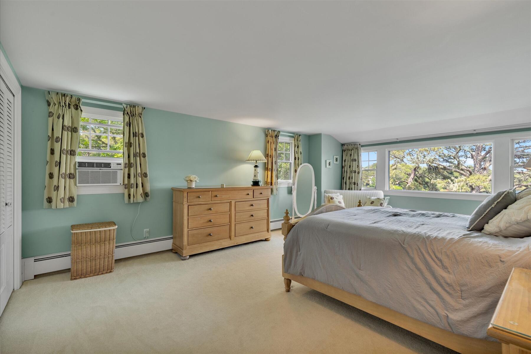 194 John Joseph Road Harwich, MA 02645 - Photo 38 of 87 a bedroom with a bed and a cabinets