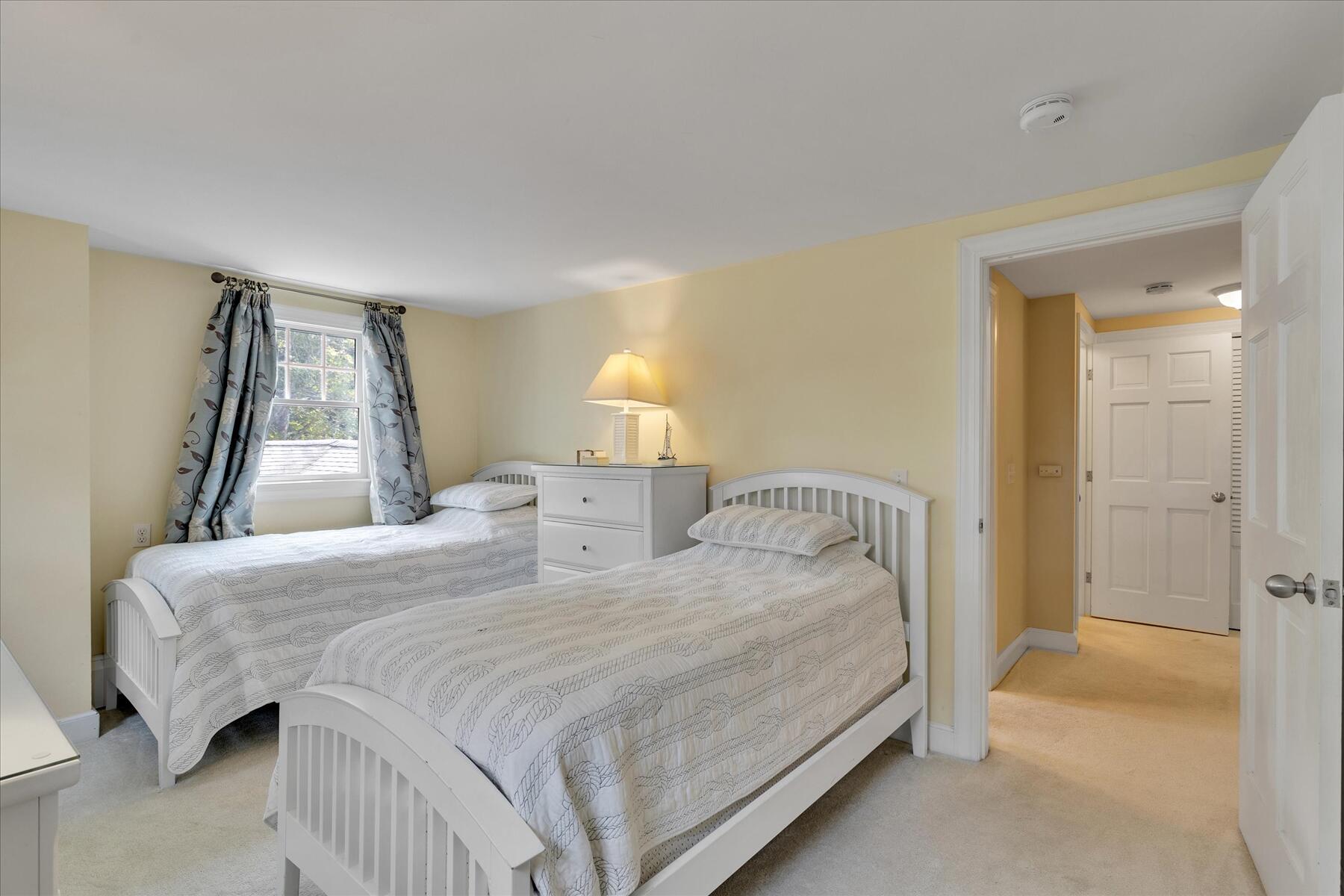 194 John Joseph Road Harwich, MA 02645 - Photo 48 of 87 a bedroom with two beds and a window