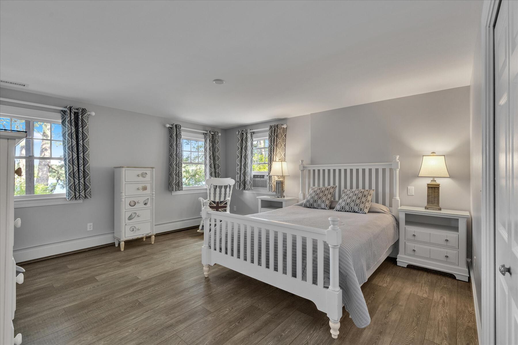 194 John Joseph Road Harwich, MA 02645 - Photo 58 of 87 a bedroom with a bed and a large window