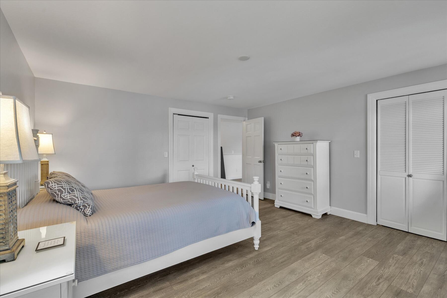 194 John Joseph Road Harwich, MA 02645 - Photo 59 of 87 a bedroom with a large bed and a closet