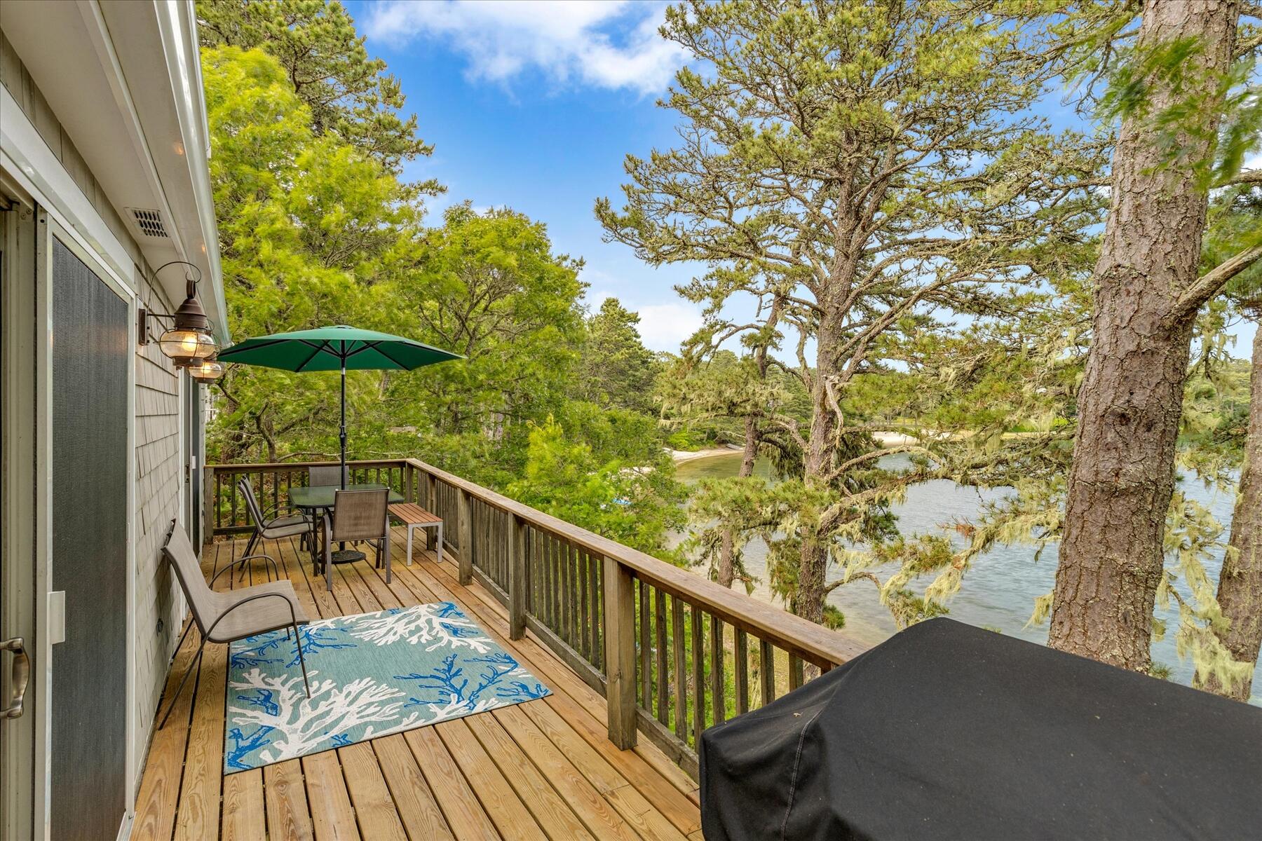 194 John Joseph Road Harwich, MA 02645 - Photo 79 of 87 a view of balcony with wooden floor and seating space