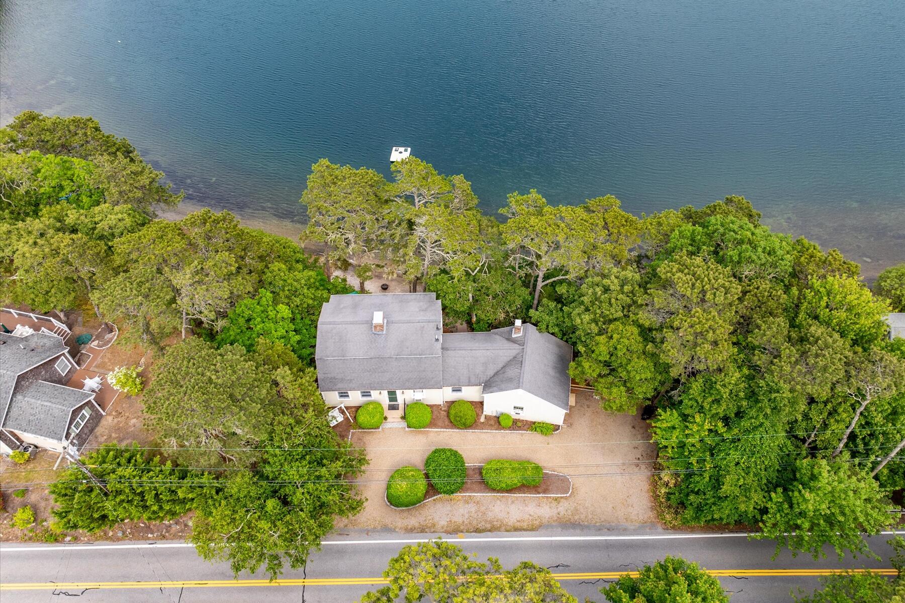 194 John Joseph Road Harwich, MA 02645 - Photo 8 of 87 an aerial view of a house