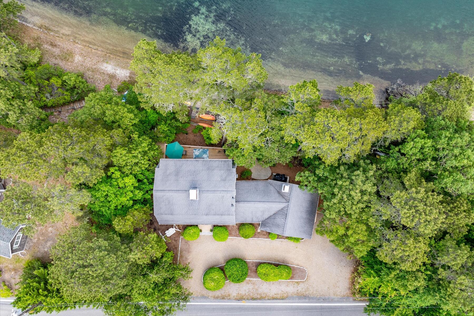 194 John Joseph Road Harwich, MA 02645 - Photo 82 of 87 an aerial view of a house with a yard swimming pool and outdoor seating