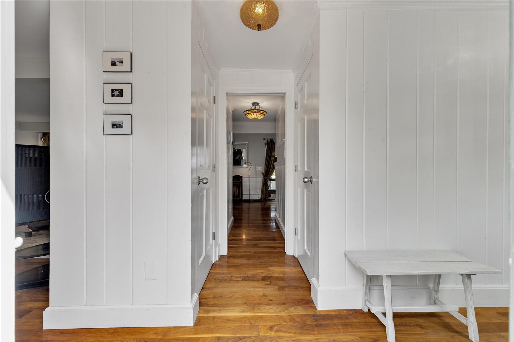 194 John Joseph Road Harwich, MA 02645 - Photo 9 of 87 a view of a hallway with wooden floor and windows
