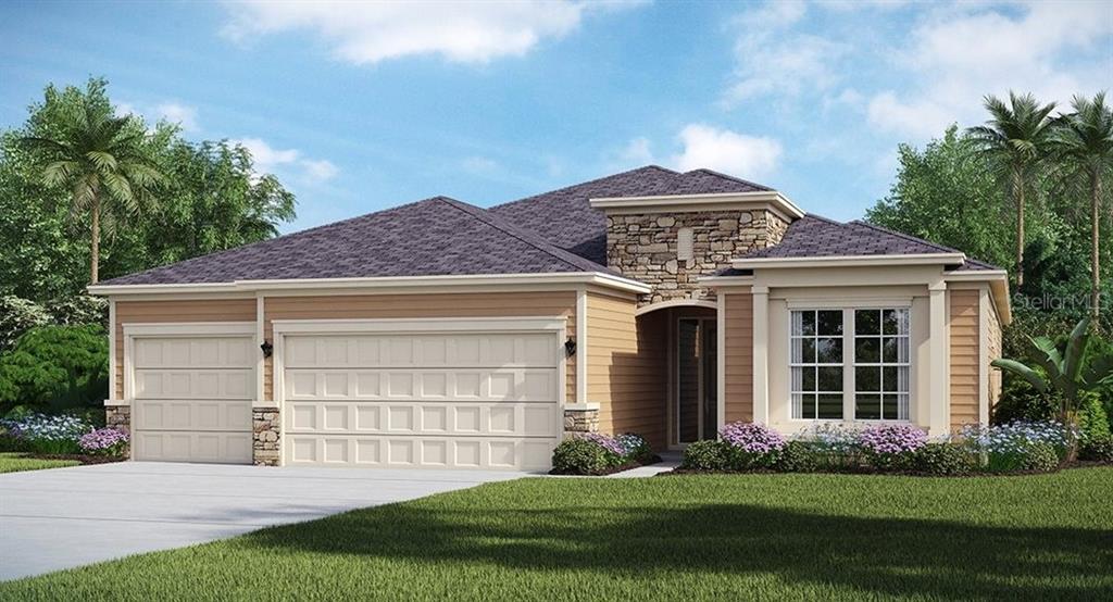1320 Southeast 42nd Road Ocala, FL 34480 - Photo 1 of 1 a front view of a house with a yard