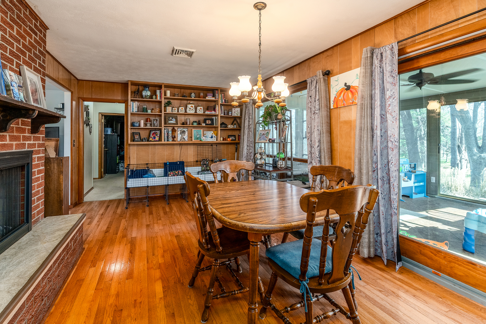 218 Blessing Circle Murphysboro, IL 62966 - Photo 11 of 40 a dining room with furniture a chandelier and wooden floor