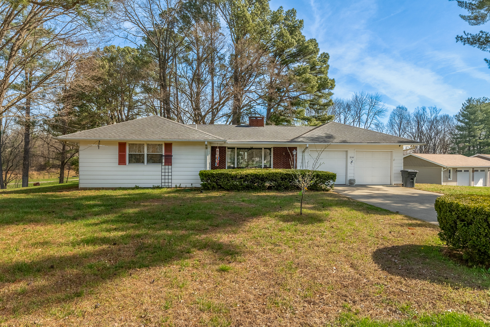 218 Blessing Circle Murphysboro, IL 62966 - Photo 2 of 40 a front view of a house with a yard table and chairs