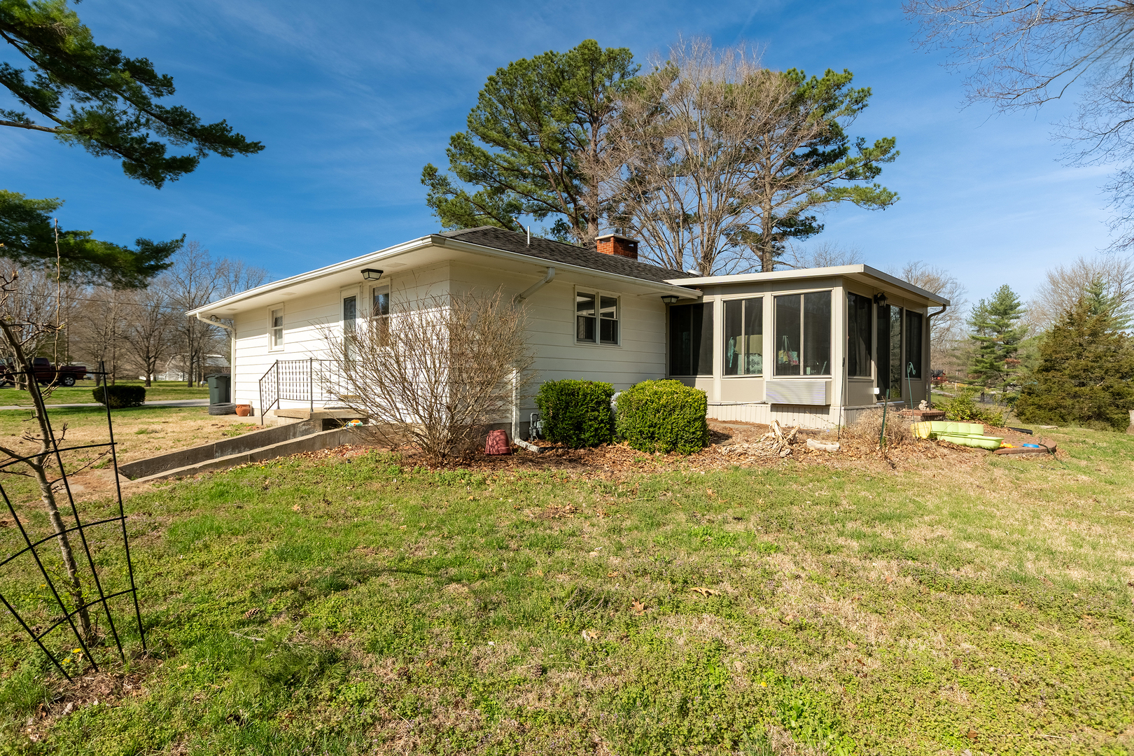 218 Blessing Circle Murphysboro, IL 62966 - Photo 33 of 40 a front view of house with yard and trees in the background